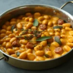 Creamy Butternut Squash Gnocchi with Sausage in rustic bowl