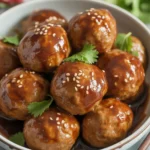 Crockpot BBQ Meatballs glazed with smoky sauce