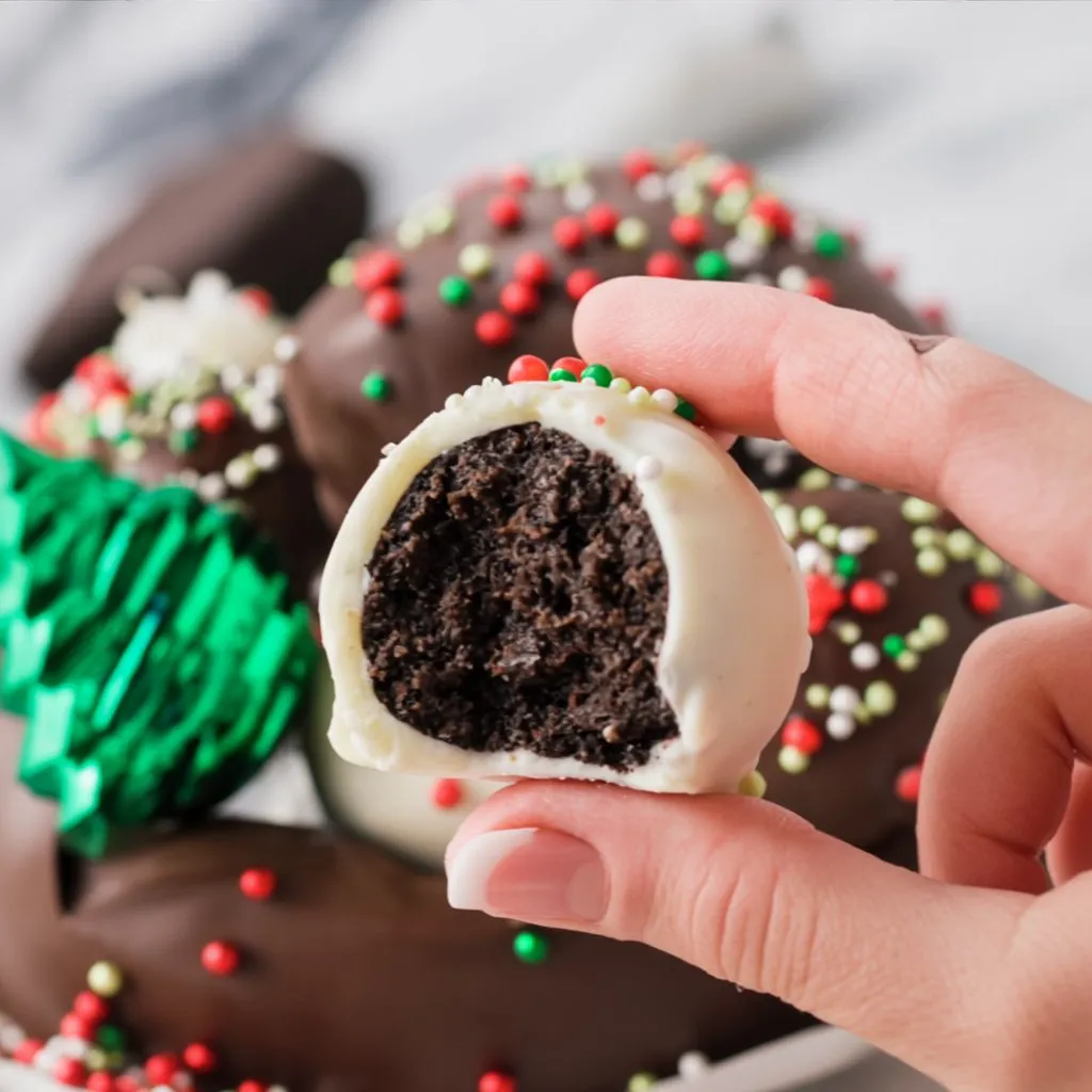 Easy No Bake Christmas Cookie Balls 15 Making no bake chocolate peanut butter balls for Christmas