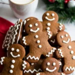 Decorated gingerbread men cookies on baking tray