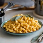 creamy butternut squash mac and cheese in a baking dish
