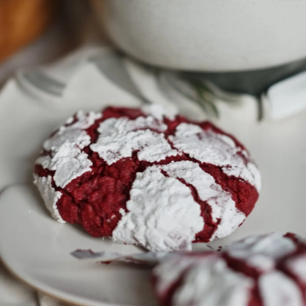 Red Velvet Crinkle Cookies dusted with powdered sugar