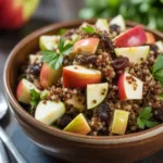 Cranberry Apple Quinoa Salad with fresh apples, cranberries, and quinoa in a bowl
