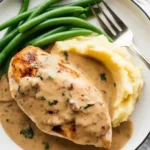 Creamy Garlic Parmesan Chicken served with a side of vegetables