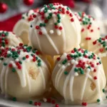 Delicious Sugar Cookie Truffles topped with sprinkles and white chocolate