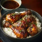 Delicious Honey Soy Chicken Drumsticks garnished with green onions