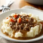 Savory ground beef and gravy served over mashed potatoes