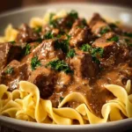 Delicious Beef Stroganoff served with egg noodles on a plate