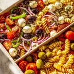 Colorful and fresh pasta salad with vegetables and dressing