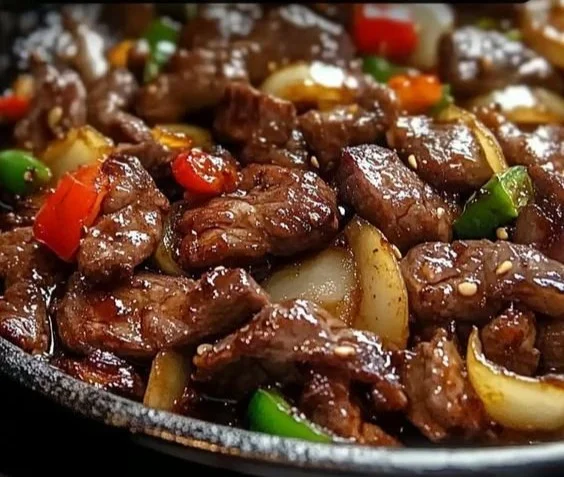 Sizzling Chinese Pepper Steak with Onions 24 Sizzling Chinese Pepper Steak with Onions