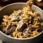 Delicious bowl of the world's best beef stroganoff served with pasta