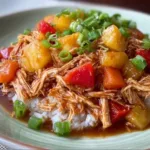 Delicious Hawaiian Crockpot Chicken served with pineapple and veggies