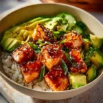 Honey Glazed Salmon Bowl with fresh vegetables and rice