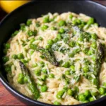 One pot orzo with asparagus dish, showcasing vibrant vegetables and pasta