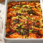 Delicious homemade salmon sushi bake with fresh ingredients and flavors.