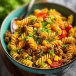 Colorful Taco Pasta Salad with fresh vegetables and taco seasoning