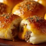 Garlic Parmesan Cheeseburger Bombs served on a rustic wooden platter